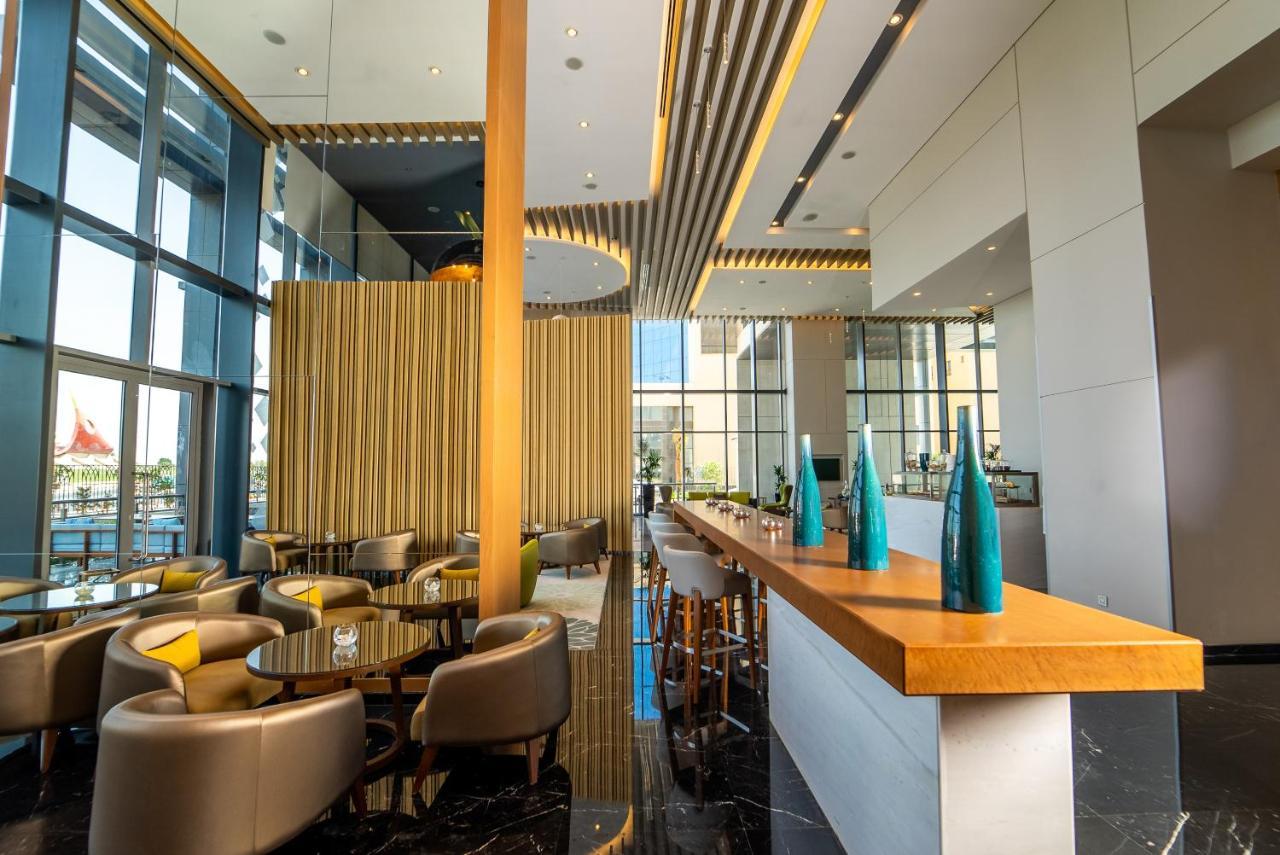 Hotel Dana Rayhaan By Rotana Dammam Exterior foto The lounge at the airport