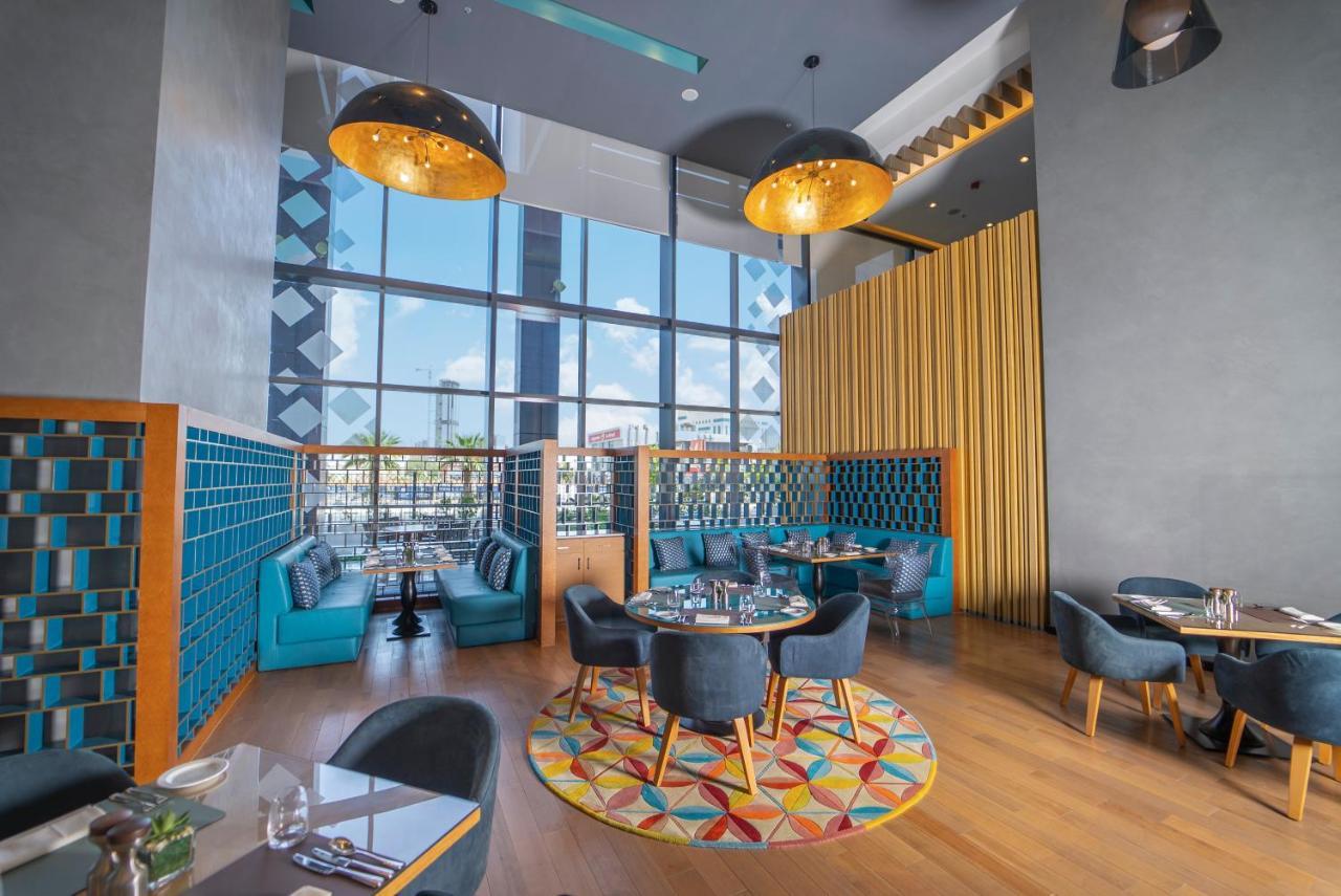 Hotel Dana Rayhaan By Rotana Dammam Exterior foto The interior of the restaurant