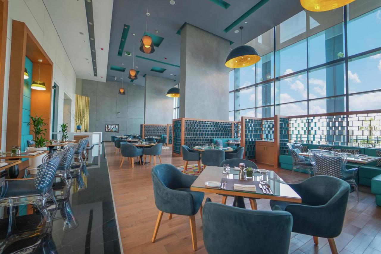 Hotel Dana Rayhaan By Rotana Dammam Exterior foto The lounge at the airport