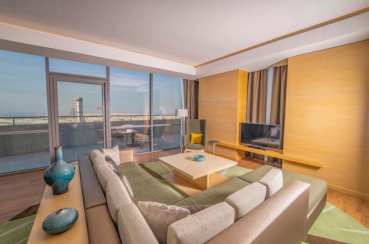 Hotel Dana Rayhaan By Rotana Dammam Exterior foto A living room at the hotel